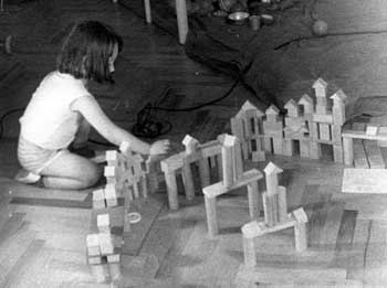Jane is building a town from bricks
